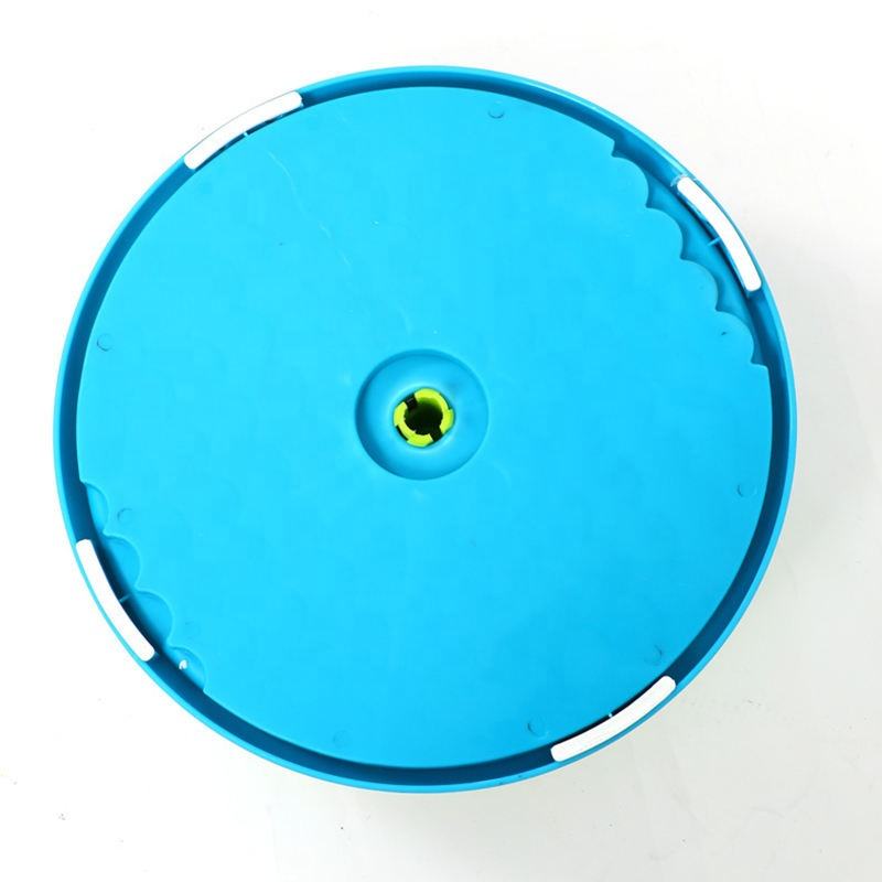 Blue underside of round dog slow feeder with anti-slip pads